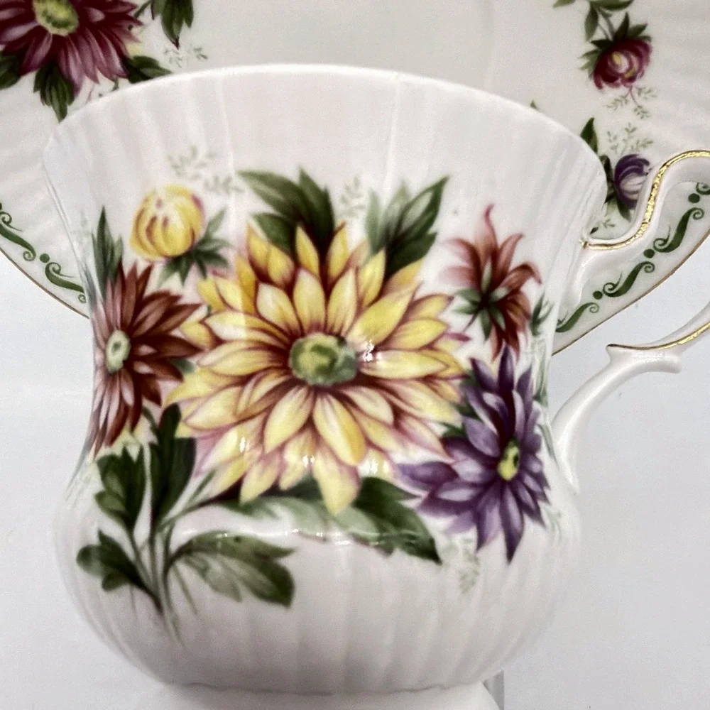 Vintage Queen's Rosina Wild Flowers fine bone china Tea cup with matching saucer